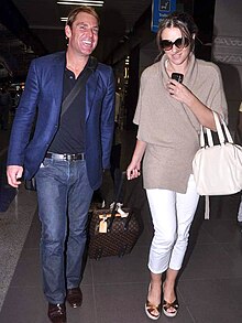 Hurley with then-fiance Shane Warne in 2012 Shane Warne with, Liz Hurley snapped at the airport (5) (cropped).jpg