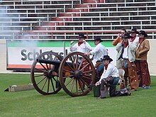 The Texas Cowboys fire Smokey the Cannon during a football game. Smokey the Canon.jpg