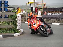 Southern "100" racing which takes place annually on the nearby Billown Circuit at Malew Road bridge under which the line passes Southern 100 2010 IMG 0704.JPG