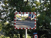 Spiegel bij de Ellerhuizerbrug (of -klap) over het Boterdiep. Het straatnaambordje geeft Plattenburg aan, de weg langs de vaart naar Zuidwolde.