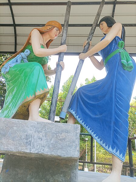 File:Statues of 2 Meitei women doing the ancient traditional practice of grinding (pounding) paddy (rice) using some unique kinds of large mortar and pestles — Cultural heritages of Meitei civilization — MMRC & Unity Park 11.jpg