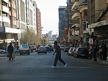 A street in Hillbrow in 2006. Street scene in Hillbrow, Johannesburg, South Africa.jpg