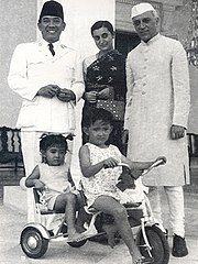 Jawaharlal Nehru and his daughter Indira Gandhi with Sukarno, Megawati Sukarnoputri and Guruh Sukarnoputra, Indonesia, 1950. Sukarno with children and Nehru.jpg