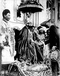 Coronation of Haile Selassie as Negus ("King") of the Ethiopian Empire in 1928. He would be crowned again in 1930 as Neguse Negest ("King of Kings"). The-crowning-of-Haile-Selassie-as-Negus-of-Abessinia-352035546610.jpg