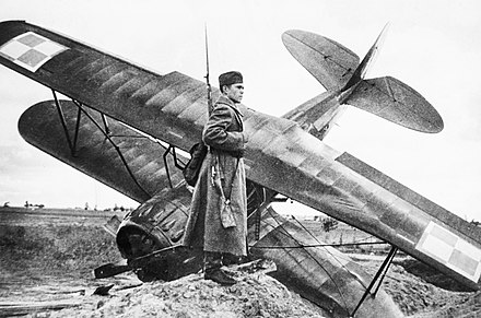 Red Army soldier guarding a Polish PWS-26 trainer aircraft shot down near the city of Równe (Rivne) in the Soviet occupied part of Poland, 18 September 1939.
