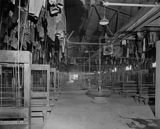 View showing miners' clothes suspended by pulleys, also wash basins and ventilation system, Kirkland Lake, Ontario, 1936. View showing miners' clothes.jpg