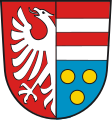 Landkreis Krumbach (Schwaben) (1862–1972) Gespalten und hinten geteilt; vorne in Rot ein halber silberner Adler am Spalt; hinten oben dreimal geteilt von Rot und Silber, unten in Blau drei, zwei zu eins gestellte goldene Kugeln.