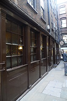 Ye Olde Cheshire Cheese is located in an alley off Fleet Street Ye Olde Cheshire Cheese, Fleet Street, EC4 (8032557646).jpg