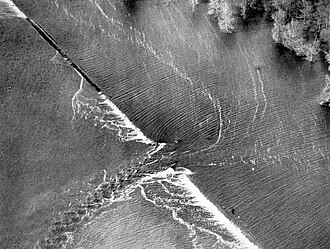 The Great Mississippi Flood of 1927 began at this break in the Mississippi River levee at Mound Landing. 1927 Mississippi Flood Levee Breach.jpg