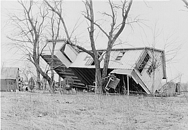 An upturned farmhouse in Posey County, Indiana