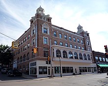 The landmark Douglass House in downtown Houghton was originally a hotel but was converted into a mixed use building in the 1980s; it is listed on the National Register of Historic Places.