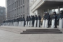Ukrainian riot police guarding the entrance to the RSA building on 7 March 2014 2014-03-07. Donetskaia oblgosadministratsiia 05.jpg