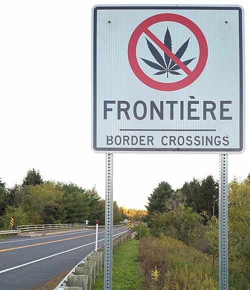 Road sign at the Canada-US border prohibiting cannabis, Abercorn, Québec (2018)