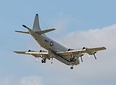 A P-3C Orion, tail number 161588, on final approach to Kadena Air Base in Okinawa, Japan. It has an AN/APS-149 Littoral Surveillance Radar System (LSRS) mounted underneath it.