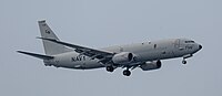 A US Navy P-8 Poseidon, tail number 168756, on final approach at Kadena Air Base in Okinawa, Japan.