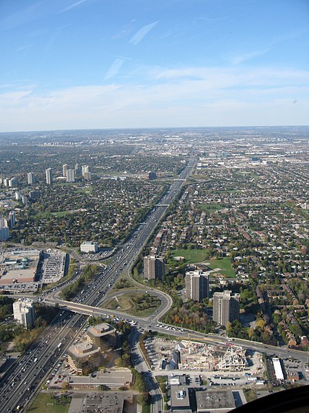 Highway 404 looking north just north of the Highway 401 / Don Valley Parkway interchange, showing the interchange with Sheppard Avenue, with Fairview 