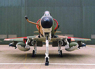 Head on profile of an A-4SU Super Skyhawk, note the cranked refuelling probe, the drooped leading edge slats as well as the ram-air intake. Also, inert AIM-9 Sidewinders painted in blue are carried on the outboard pylons. A-4SU Super Skyhawk head on.jpg