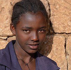 "Adigrat_Girl,_Ethiopia_(14408973364).jpg" by User:Russavia