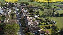 Aerial view of Kirk Deighton showing Main Street looking south Aerial photographs of Kirk Deighton (6th May 2021) 001.jpg