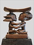 Headrest; by Luba people; 19th century; wood; height: 18.5 cm; Musée du quai Branly (Paris)[109]