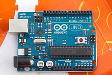 Arduino UNO R2 board with ATmega328P 8-bit microcontroller in 28-pin IC socket