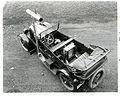 Automobile equipped with apparatus designed and constructed at NBS for measuring and recording the performances of engines and cars on the road. The instrument mounted on the running board measures the wind speed and direction relative to the car. The apparatus on the floor of the front seat measures and records graphically the instantaneous rates of gasoline flow to the carburator. The apparatus in the rear seat records sixteen separate measurements of various factors in engine and car performance on a moving strip of paper.