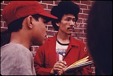 Scout leader recruiting Latino youth in New York City BOY SCOUT LEADER RECRUITING AMONG LATIN YOUTHS IN THE BEDFORD-STUYVESANT DISTRICT OF BROOKLYN IN NEW YORK CITY. THE... - NARA - 555899.jpg