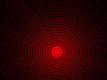 A real Airy disk created by passing a red laser beam through a 90-micrometre pinhole aperture with 27 orders of diffraction Beugungsscheibchen.k.720.jpg