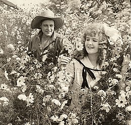 Harold Lockwood and May Allison in a scene still for the 1916 silent drama Big Tremaine