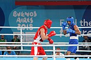 Deutsch: Boxen bei den Olympischen Jugendspielen 2018 Tag 12, 18. Oktober 2018 - Kampf um die Bronzemedaille im Fliegengewicht Mädchen – Timur Merjanow (Usbekistan, rot) schlägt Youssef Ali Karar Ali (Ägypten, blau) 5-0; Ringrichter ist Antonín Gaspar (Tschechien). English: Boxing at the 2018 Summer Youth Olympics on 18 October 2018 – Boy's heavyweight Bronze Medal Bout - Timur Merjanov (Uzbekistan, red) beats Youssef Ali Karar Ali (Egypt, blue) 5-0; Referee is Antonín Gaspar (Czech Republic). Español: Boxeo en los Juegos Olímpicos Juveniles de Verano de 2018 en 18 de octubre de 2018 - Medalla de bronce de peso pesado del muchacho: Timur Merjanov (Uzbekistán, roja) le gana a Youssef Ali Karar Ali (Egipto, azul) 5-0; El árbitro es Antonín Gaspar (Republica checa).