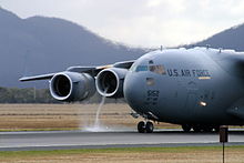 A vortex made visible as powerback is used on a Boeing C-17 Globemaster III C17 Reverse Thrust.JPG