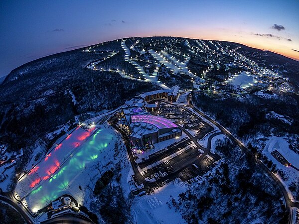 An aerial view at night of Camelback Mountain Resort in Tannersville, the largest ski resort of the Poconos