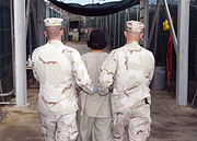 Captive being escorted for medical care, December 2007