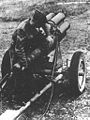 An Allied soldier inspecting a captured Nebelwerfer