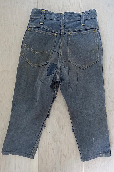 File:Children's clothing in Norway in the 1950s-1960s. Trousers (jeans) for young boys. "WILD WEST Dale-Sanfor" brand. Worn, mended DSC02603.jpg