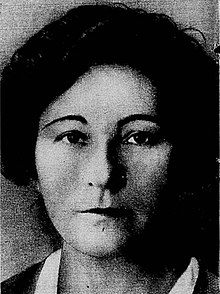 woman facing camera head-on, black and white photograph