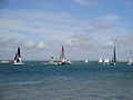 Extreme 40 class sailing catamarans, seen racing off Egypt Point, Cowes, Isle of Wight during Cowes Week in 2011. Cowes was a stage on the Extreme 40 races for 2011. Races were run off Egypt Point (by the Extreme 40 tent), and were separate from the standard Cowes Week races (that start from the Royal Yacht Squadron).