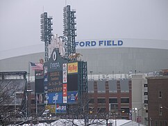 Ford Field on Super Bowl XL Sunday, countdown to kickoff on Comerica Park's scoreboard.