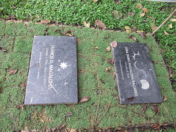 Grave of Francis Magalona and his granddaughter, Luna Isabel Bacarro, daughter of Saab Magalona, at Loyola Memorial Park, Marikina
