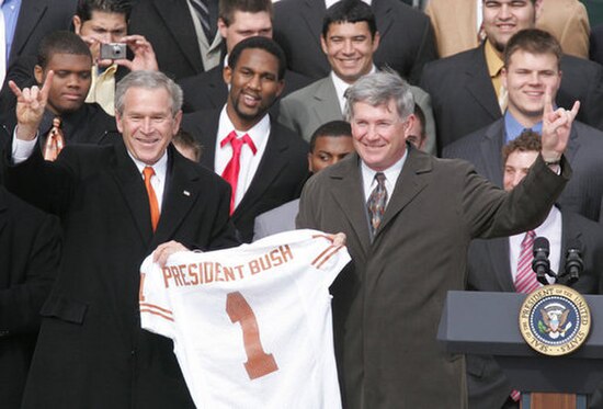 Texas team and coach Mack Brown with President George W. Bush after winning the 2005 national championship