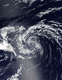Сателитно изображение на Хектор като тропическа депресия в западната част на Тихия океан в началото на 16 август