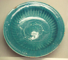 Islamic pottery with turquoise glaze and fish motif, in imitation of Chinese celadon ware, probably Iran, 14th century Islamic pottery with turpuoise glaze and fish motif in imitation of Chinese celadon ware probably Iran 14th century.jpg