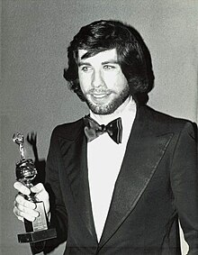 John Travolta with a special Golden Globe as 'World Film Favorites', which he received along with Jane Fonda. John Travolta with Golden Globe Award 1979.jpg