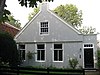 Tweebeukig houten huis