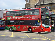 First London Wright Gemini HEV 2 on Kilburn High Road in May 2009 London Bus route 328 hybrid bus A.jpg