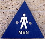 Male symbol on public restroom