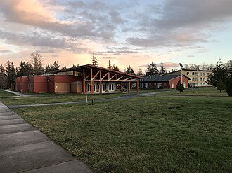 Buildings on the NWIC Lummi campus Northwest Indian College at dusk.jpg