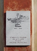 Mramorová deska s kopii kresby V.Plocka umístěná na domě, ve kterém žil