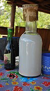 Bottle of pulque at a stall in Zacatlán, Puebla, Mexico