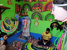 A typical mask shop at Charida. Purulia Chhau mask shop.jpg